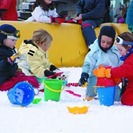 Con niños en la nieve